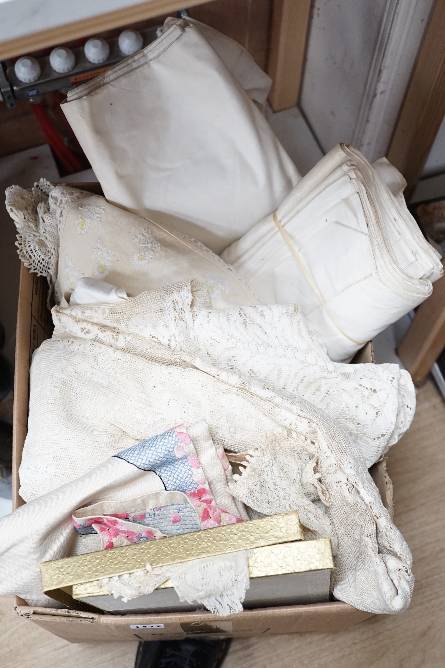 A selection of early 20th century cotton and lace